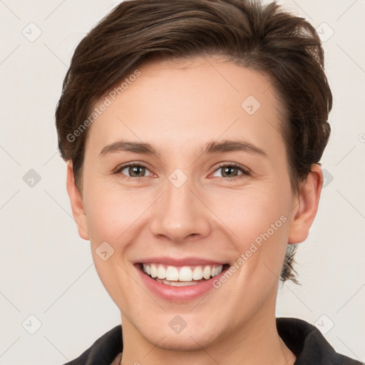 Joyful white young-adult female with short  brown hair and brown eyes