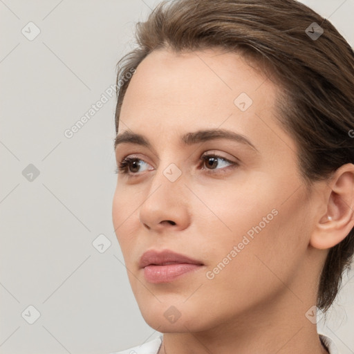 Neutral white young-adult female with medium  brown hair and brown eyes