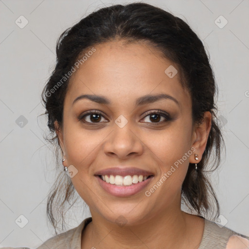 Joyful latino young-adult female with medium  brown hair and brown eyes