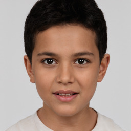 Joyful white child male with short  brown hair and brown eyes