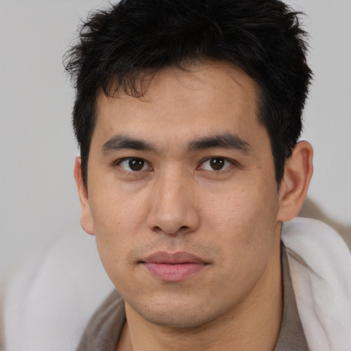 Neutral asian young-adult male with short  black hair and brown eyes