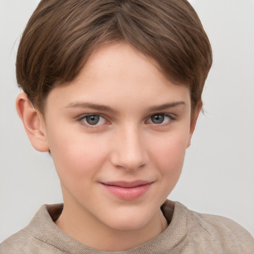 Joyful white child female with short  brown hair and grey eyes