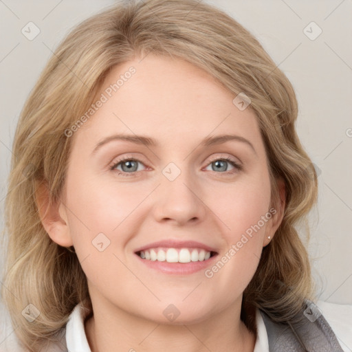 Joyful white young-adult female with medium  brown hair and blue eyes