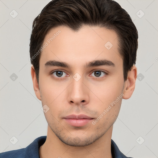 Neutral white young-adult male with short  brown hair and brown eyes