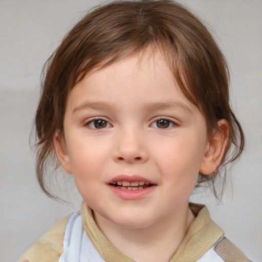 Joyful white child female with medium  brown hair and brown eyes