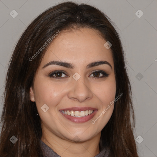 Joyful white young-adult female with long  brown hair and brown eyes