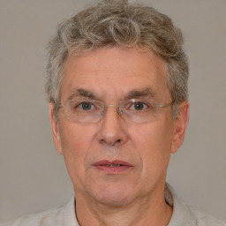 Neutral white middle-aged male with short  gray hair and brown eyes