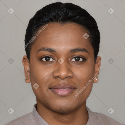 Joyful black young-adult female with short  black hair and brown eyes