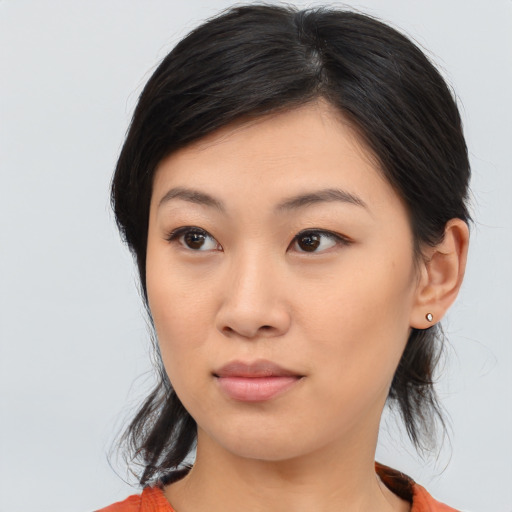 Neutral asian young-adult female with medium  black hair and brown eyes