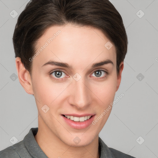 Joyful white young-adult female with short  brown hair and grey eyes