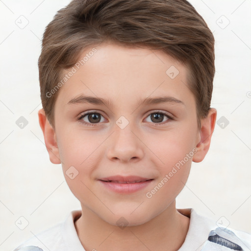 Joyful white child male with short  brown hair and brown eyes