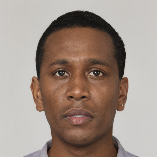 Neutral black young-adult male with short  black hair and brown eyes