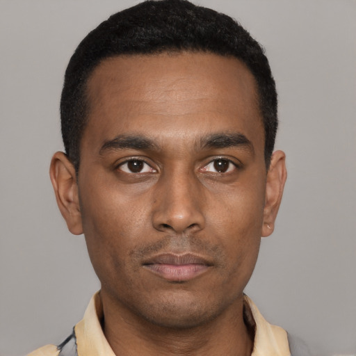 Neutral black young-adult male with short  black hair and brown eyes