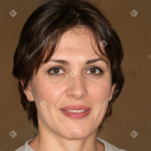 Joyful white adult female with medium  brown hair and brown eyes