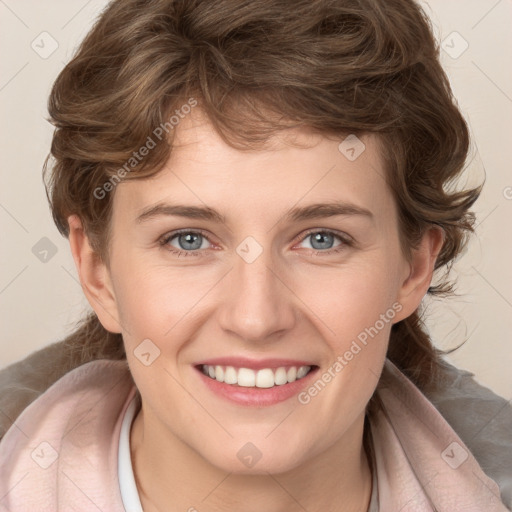 Joyful white young-adult female with medium  brown hair and blue eyes