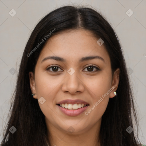 Joyful latino young-adult female with long  brown hair and brown eyes