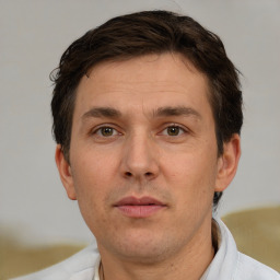 Neutral white adult male with short  brown hair and brown eyes