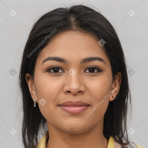 Joyful latino young-adult female with medium  brown hair and brown eyes