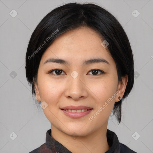 Joyful asian young-adult female with medium  black hair and brown eyes