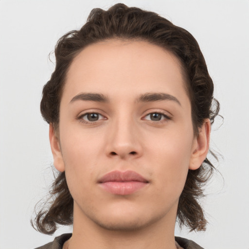 Neutral white young-adult female with medium  brown hair and brown eyes