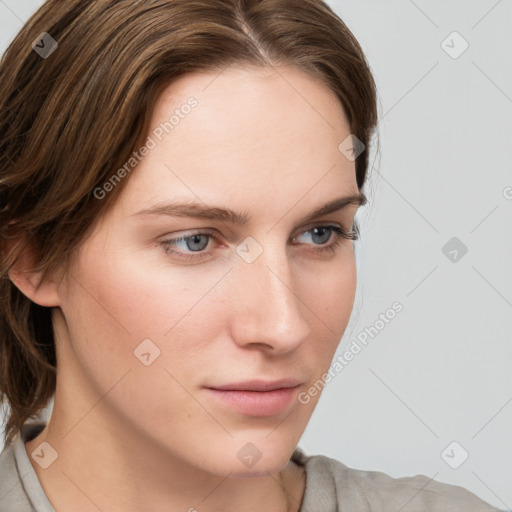 Neutral white young-adult female with medium  brown hair and grey eyes