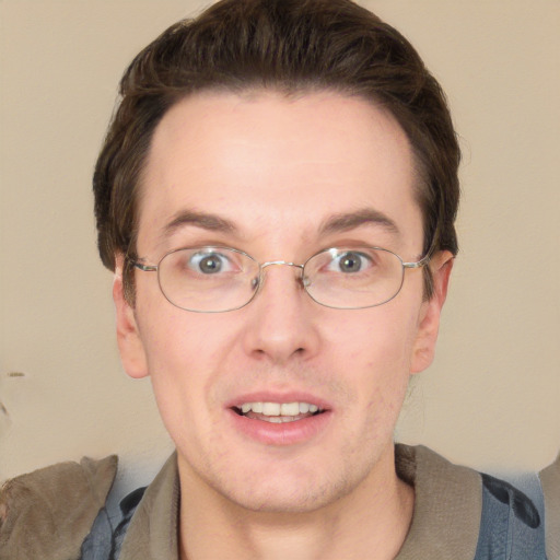 Joyful white adult male with short  brown hair and grey eyes