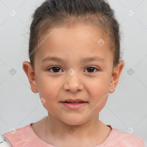 Joyful white child female with short  brown hair and brown eyes