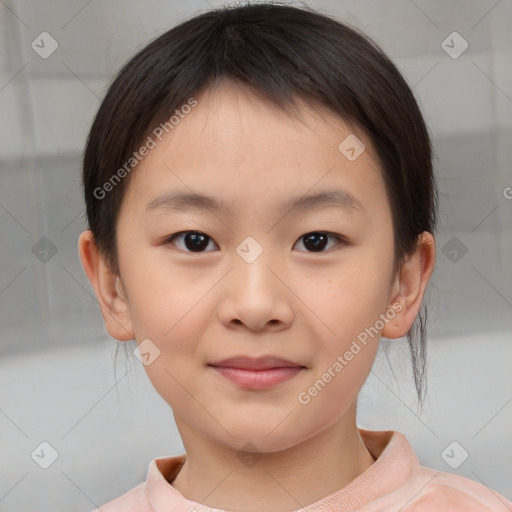 Joyful white child female with short  brown hair and brown eyes