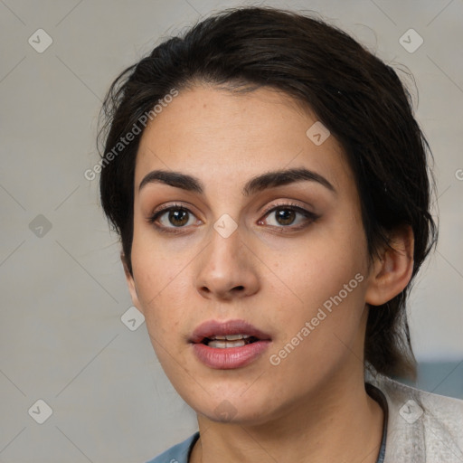 Neutral white young-adult female with medium  black hair and brown eyes