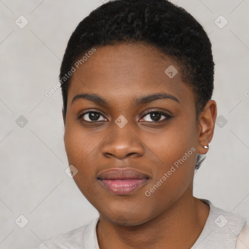 Joyful black young-adult female with short  black hair and brown eyes