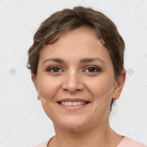 Joyful white young-adult female with short  brown hair and grey eyes