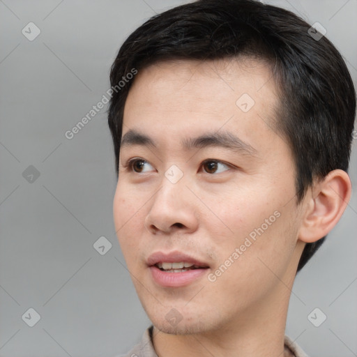 Neutral white young-adult male with short  black hair and brown eyes