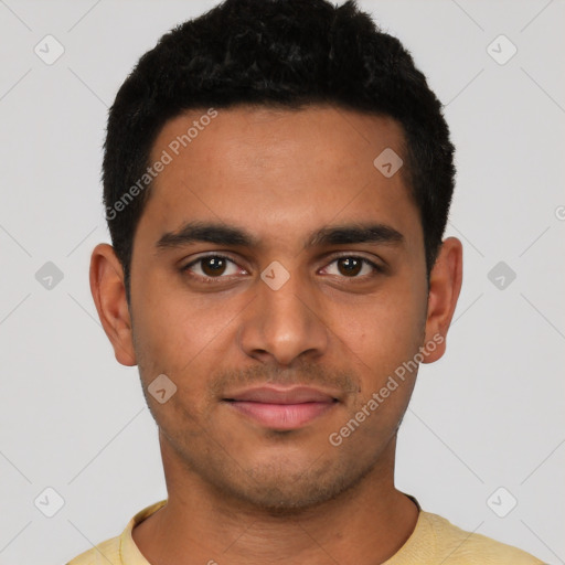 Joyful latino young-adult male with short  brown hair and brown eyes