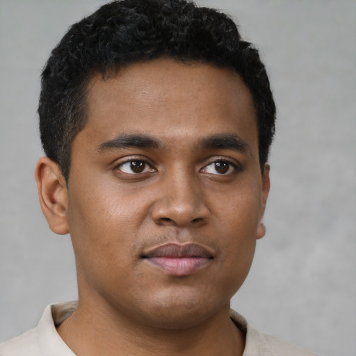 Neutral black young-adult male with short  brown hair and brown eyes