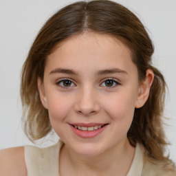 Joyful white child female with medium  brown hair and brown eyes