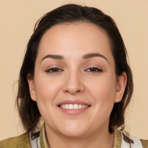 Joyful white young-adult female with medium  brown hair and brown eyes