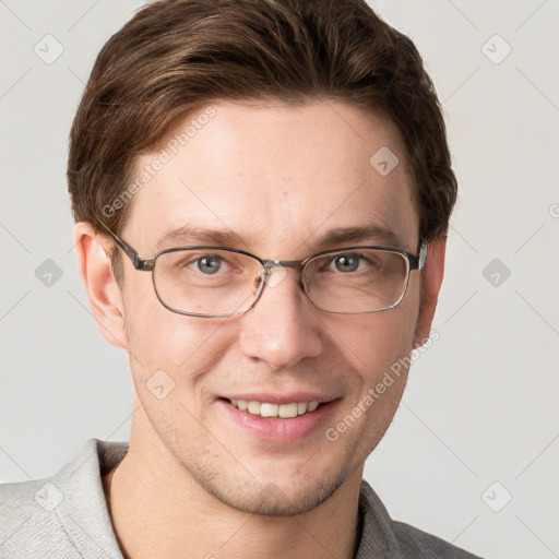 Joyful white adult male with short  brown hair and grey eyes