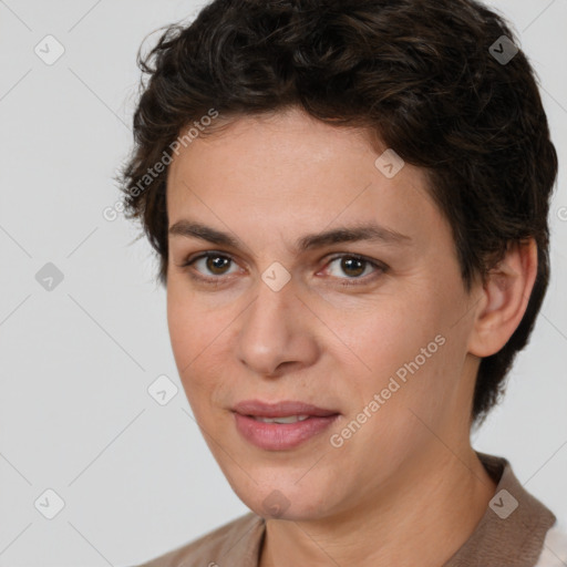 Joyful white adult female with short  brown hair and brown eyes