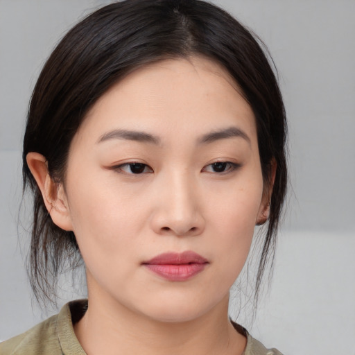 Neutral white young-adult female with medium  black hair and brown eyes