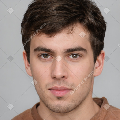 Neutral white young-adult male with short  brown hair and brown eyes