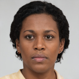 Neutral black young-adult female with short  brown hair and brown eyes