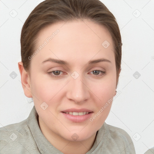 Joyful white young-adult female with long  brown hair and grey eyes