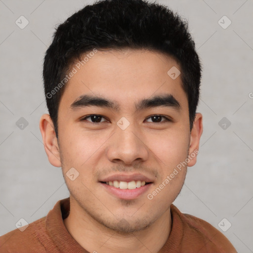 Joyful latino young-adult male with short  brown hair and brown eyes