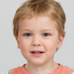 Joyful white child male with short  brown hair and brown eyes