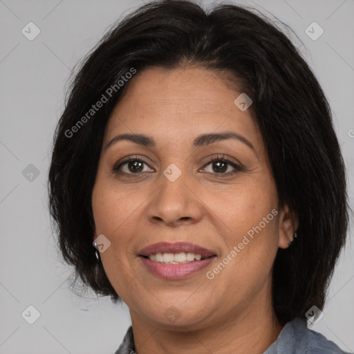 Joyful white adult female with medium  brown hair and brown eyes