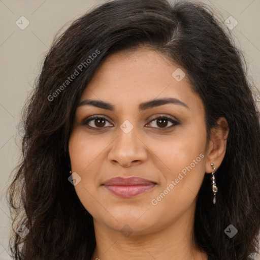 Joyful latino young-adult female with long  brown hair and brown eyes