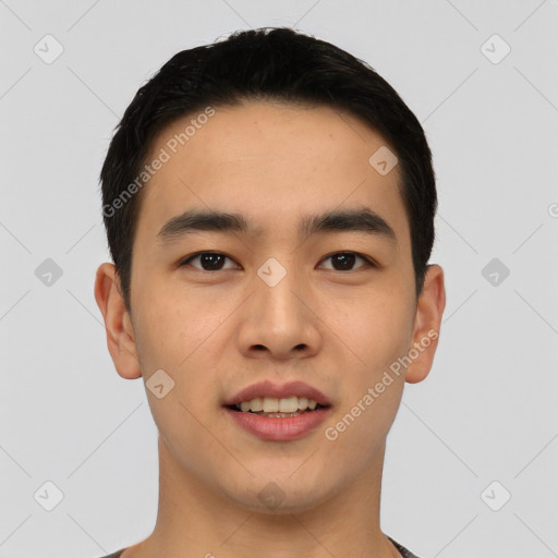 Joyful asian young-adult male with short  black hair and brown eyes