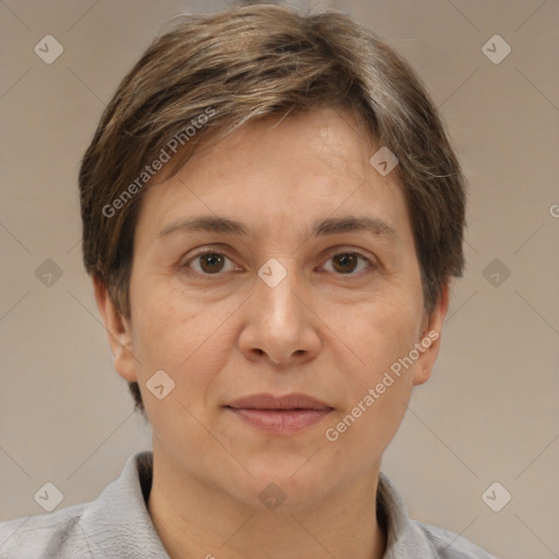 Joyful white adult female with short  brown hair and brown eyes