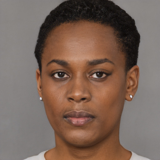 Neutral black young-adult female with short  black hair and brown eyes