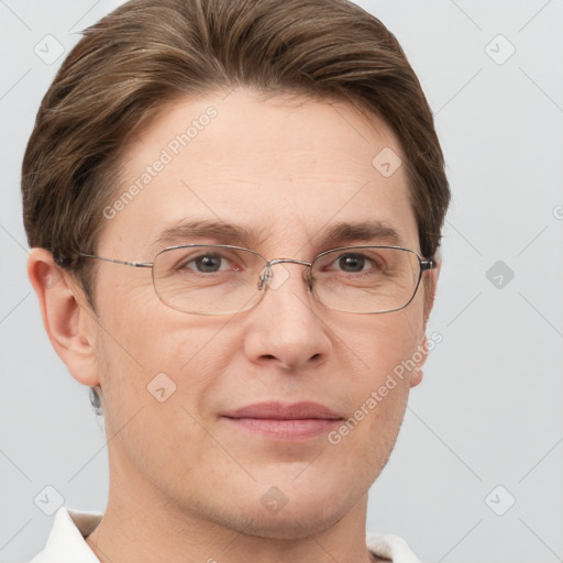 Joyful white adult male with short  brown hair and grey eyes